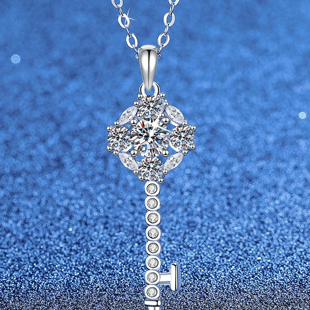 Star Key Moissanite Pendant Necklace with Cubic Zirconia in Platinum-Plated S925 Sterling Silver blue background angled view