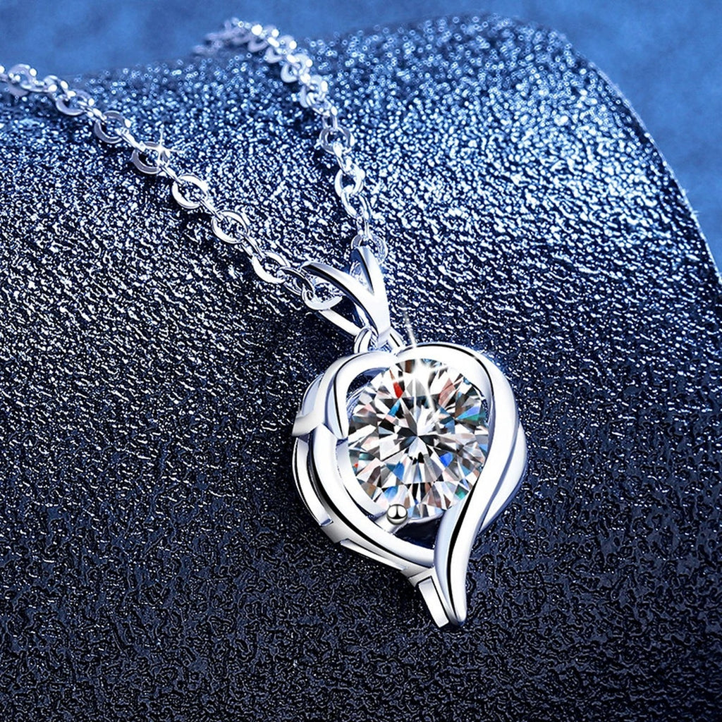 Heart Swirl Moissanite Pendant Necklace with Cubic Zirconia in Platinum-Plated S925 Sterling Silver blue background product view