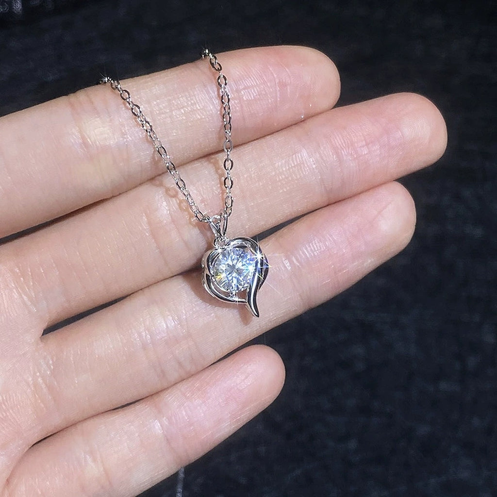 Heart Swirl Moissanite Pendant Necklace with Cubic Zirconia in Platinum-Plated S925 Sterling Silver close-up product detail view