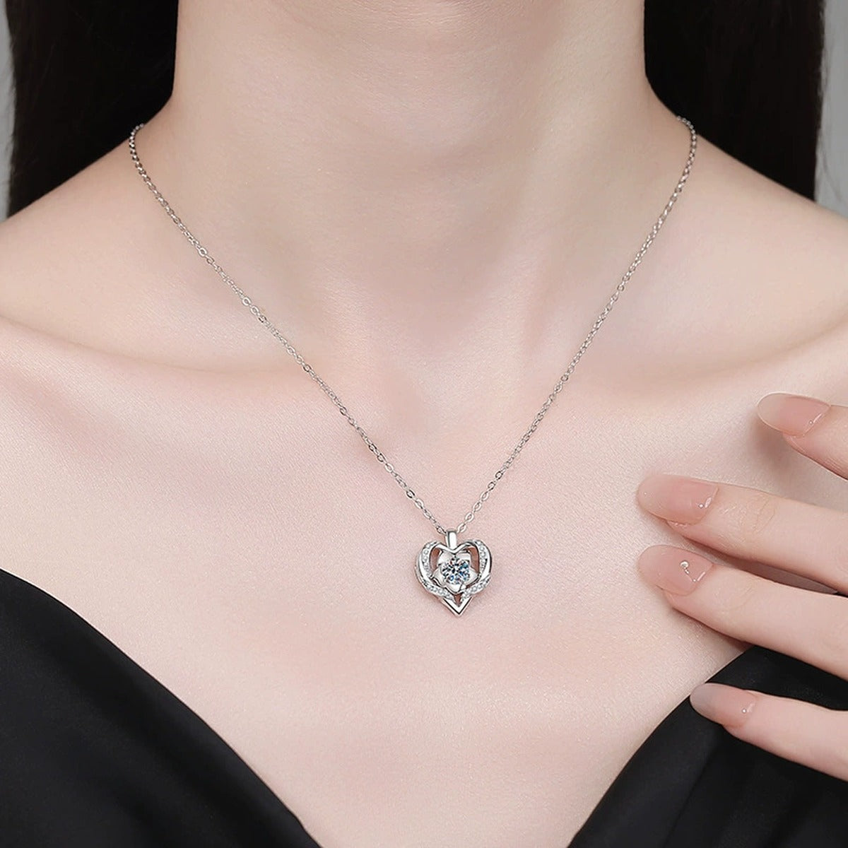 Layered Heart Moissanite Pendant Necklace with Cubic Zirconia in Platinum-Plated S925 Sterling Silver worn on neckline by model
