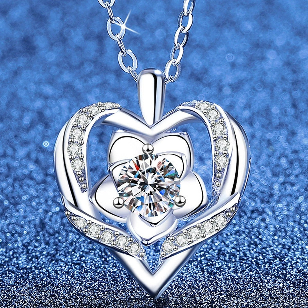 Layered Heart Moissanite Pendant Necklace with Cubic Zirconia in Platinum-Plated S925 Sterling Silver blue background angled view