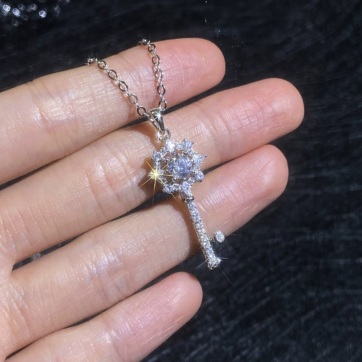Snowflake Key Moissanite Pendant Necklace with Cubic Zirconia in Platinum-Plated S925 Sterling Silver close-up product detail view