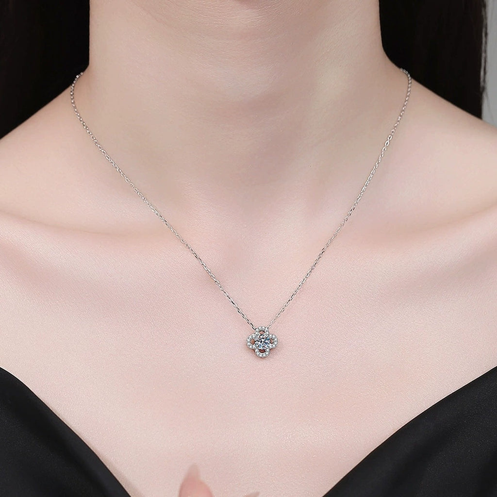 Clover Flower Moissanite Pendant Necklace with Cubic Zirconia in Platinum-Plated S925 Sterling Silver worn on neckline by model