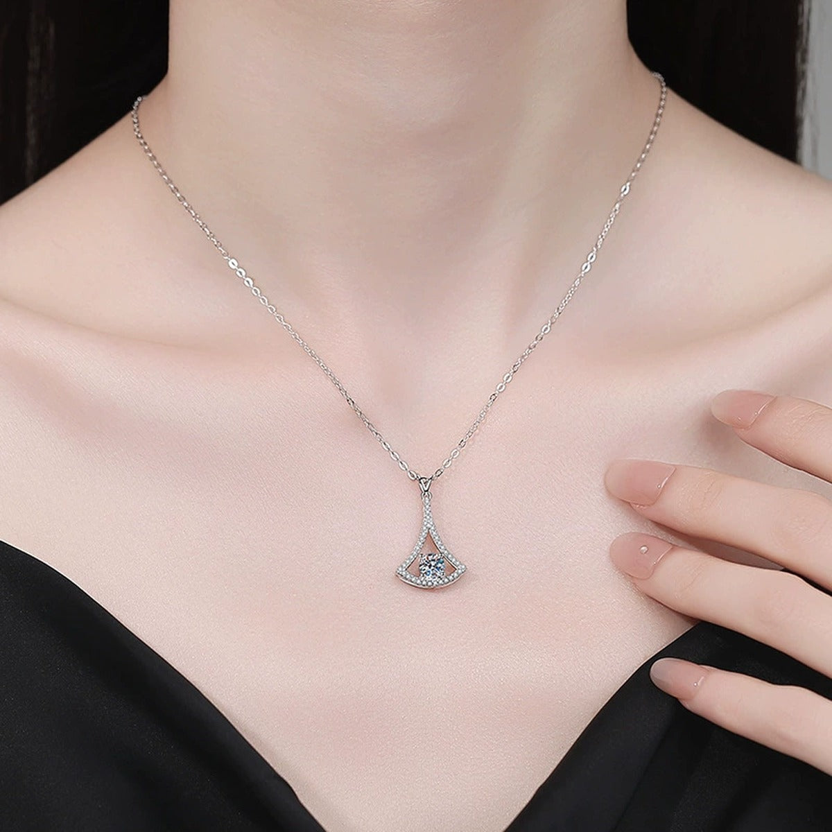 Fan Kite Moissanite Pendant Necklace with Cubic Zirconia in Platinum-Plated S925 Sterling Silver worn on neckline by model