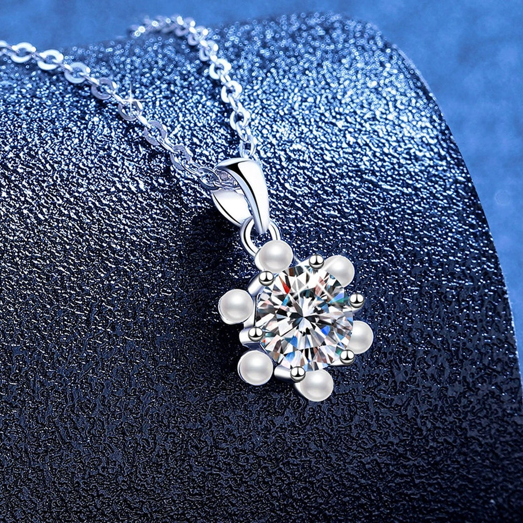 Floral Pearl Moissanite Pendant Necklace in Platinum-Plated S925 Sterling Silver blue background angled view
