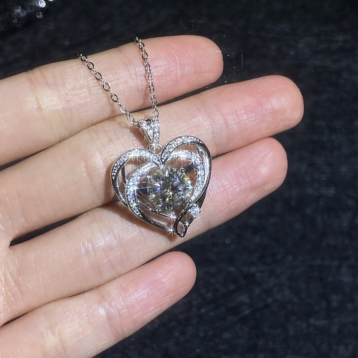Open Heart Moissanite Pendant Necklace with Cubic Zirconia in Platinum-Plated S925 Sterling Silver close-up product detail view