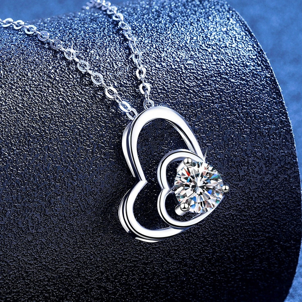 Double Heart Moissanite Pendant Necklace with Cubic Zirconia in White Gold-Plated S925 Sterling Silver blue background product view