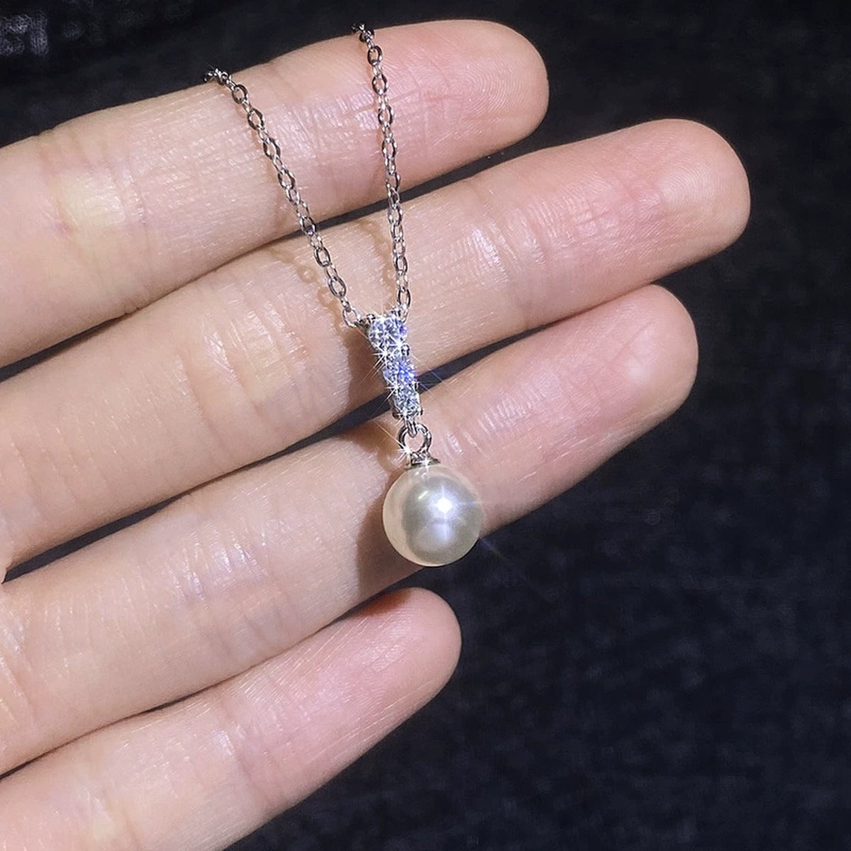Pearl Bar Moissanite Pendant Necklace in Platinum-Plated S925 Sterling Silver close-up product detail view