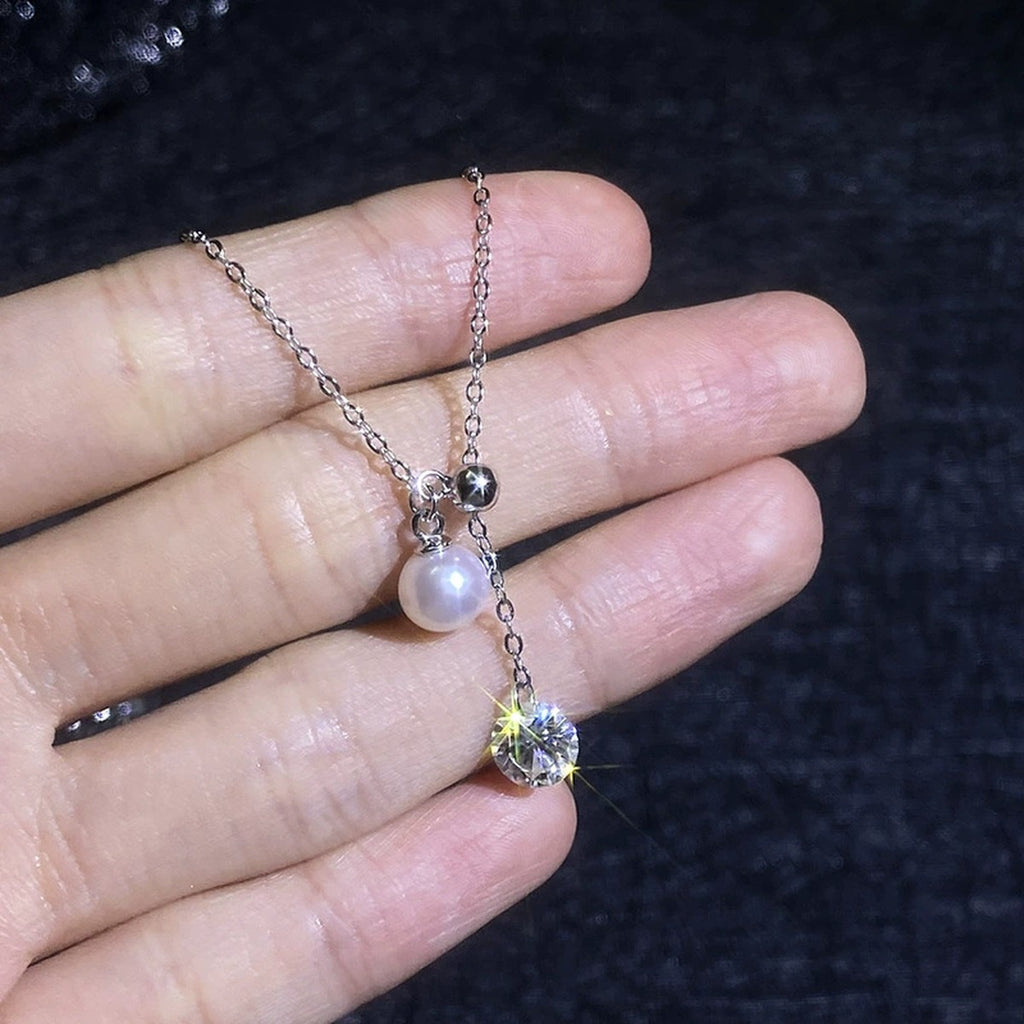 Pearl Lariat Moissanite Pendant Necklace in Platinum-Plated S925 Sterling Silver close-up product detail view