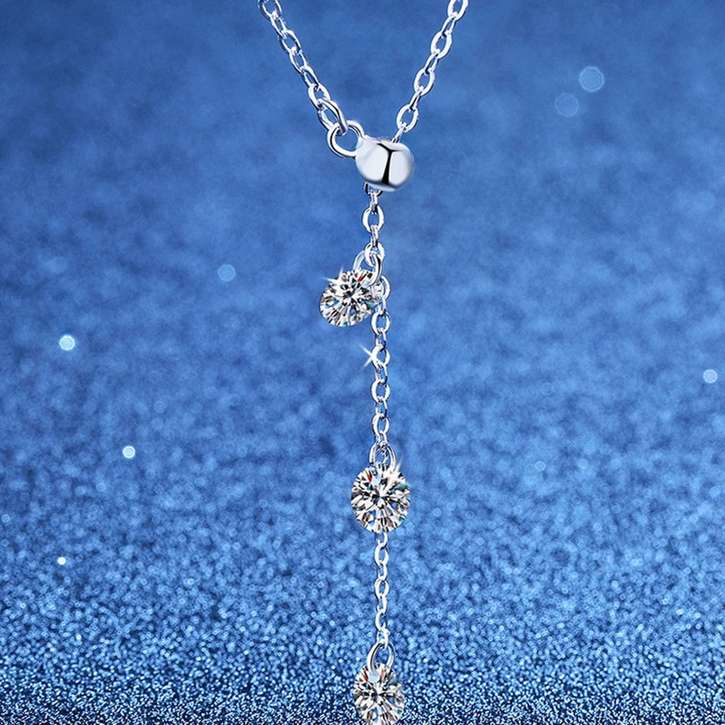 Triple Moissanite Drop Necklace in Platinum-Plated S925 Sterling Silver blue background product view