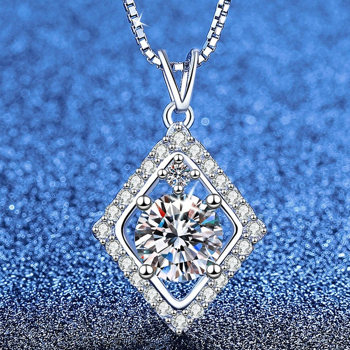 Rhombus Halo Moissanite Pendant Necklace with Cubic Zirconia in Platinum-Plated S925 Sterling Silver blue background angled view