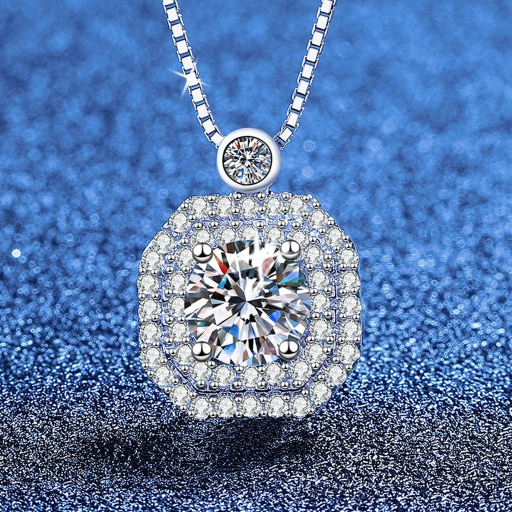 Rounded Square Moissanite Pendant Necklace with Cubic Zirconia in Platinum-Plated S925 Sterling Silver blue background angled view