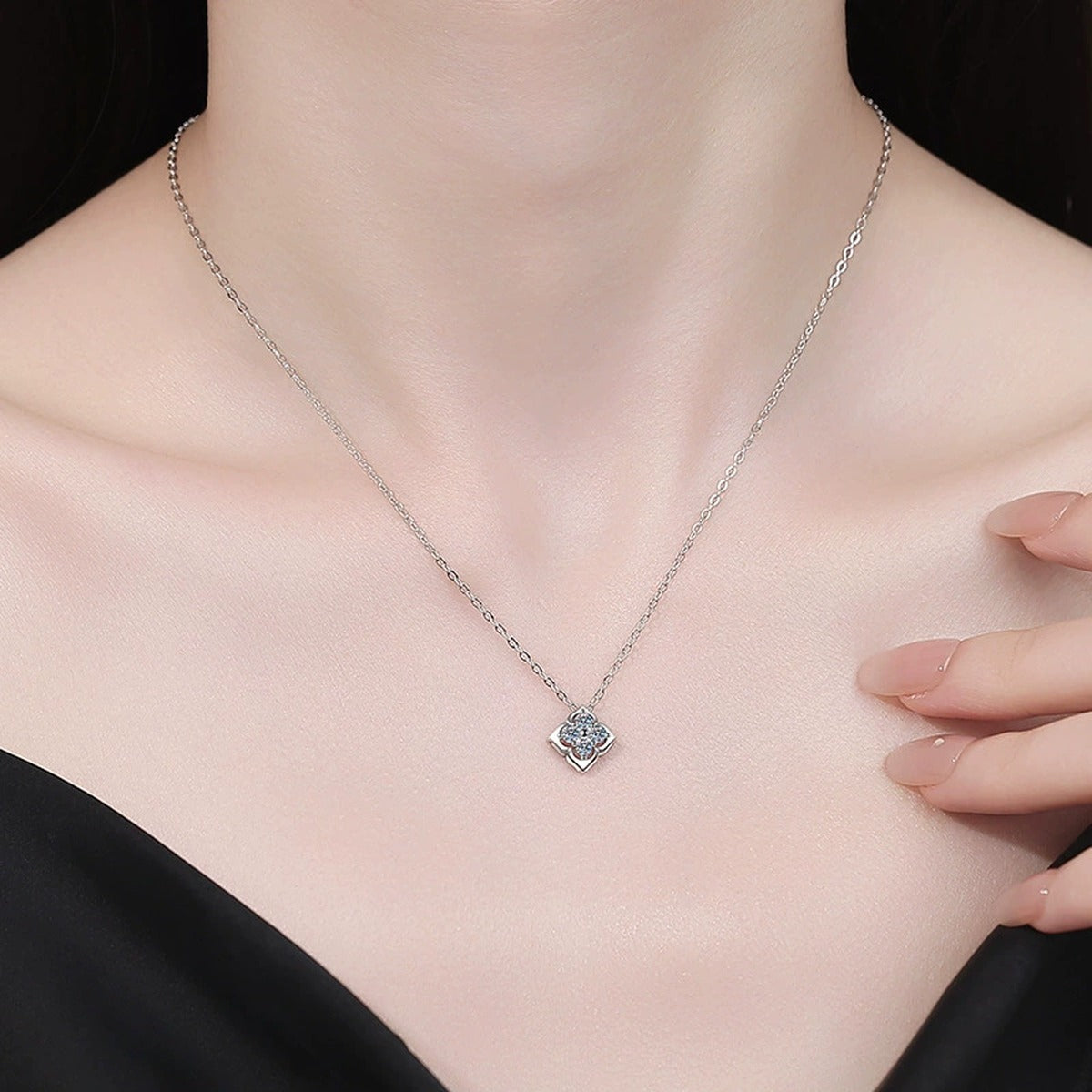 Clover Moissanite Pendant Necklace in S925 Sterling Silver worn on neckline by model