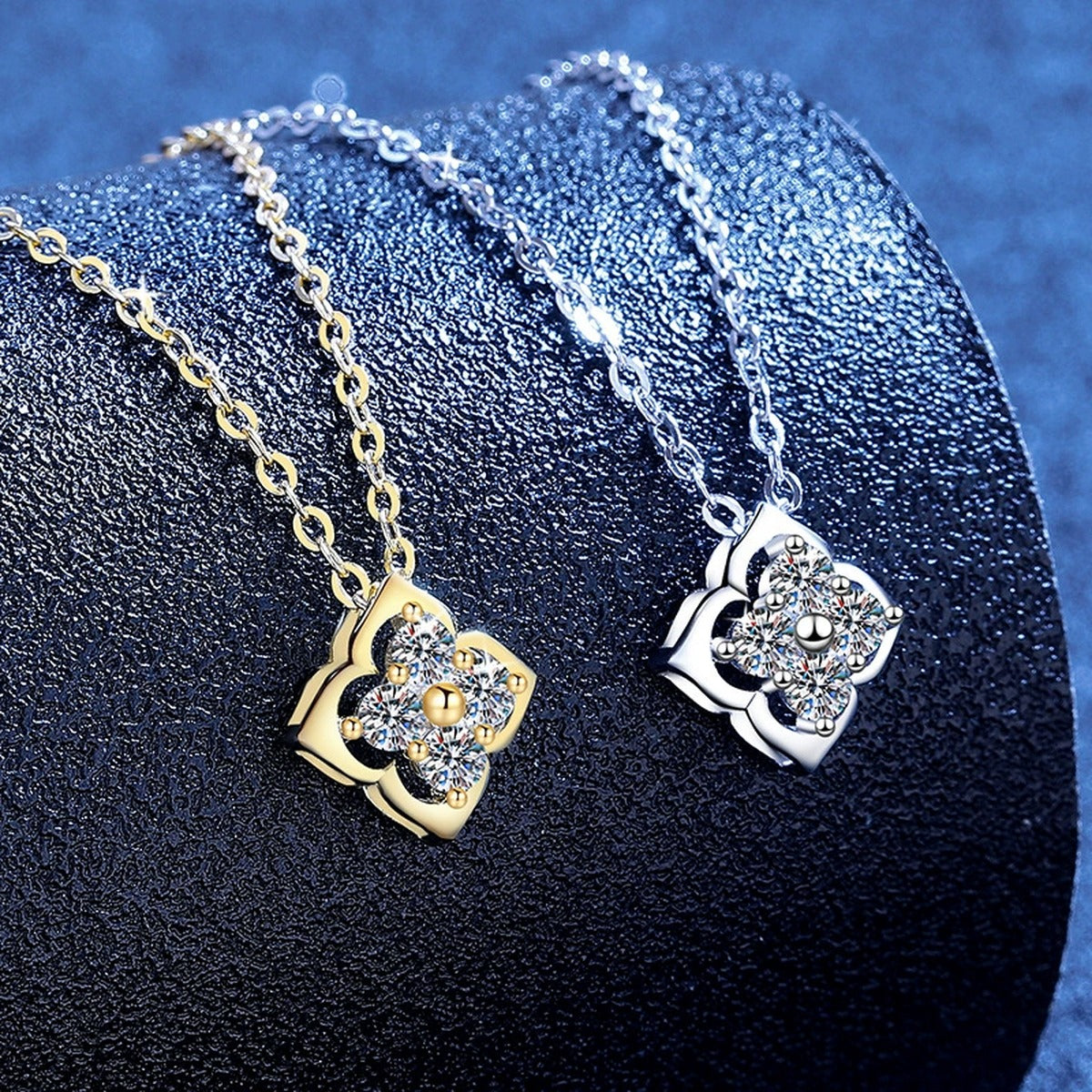 Clover Moissanite Pendant Necklace in S925 Sterling Silver blue background angled view