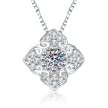 Quatrefoil Clover Moissanite Pendant Necklace with Cubic Zirconia in Platinum-Plated S925 Sterling Silver on clean white background showing the quatrefoil clover pavé pendant with a round moissanite center