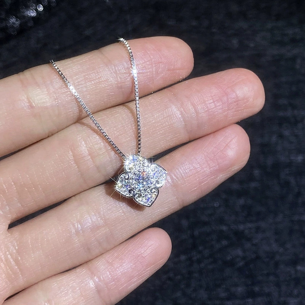 Quatrefoil Clover Moissanite Pendant Necklace with Cubic Zirconia in Platinum-Plated S925 Sterling Silver close-up product detail view