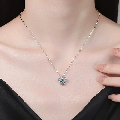 Bow Moissanite Pendant Necklace with Cubic Zirconia in Platinum-Plated S925 Sterling Silver worn on neckline by model