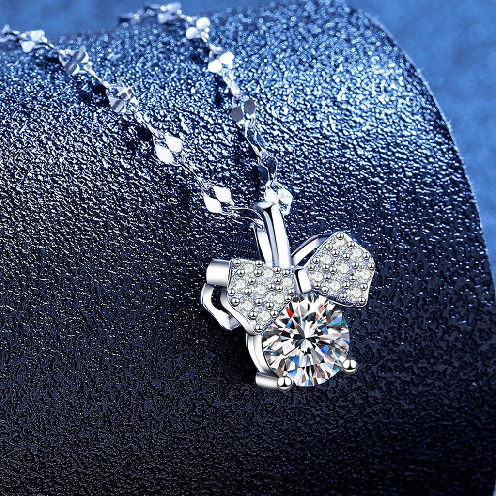 Bow Moissanite Pendant Necklace with Cubic Zirconia in Platinum-Plated S925 Sterling Silver blue background product view
