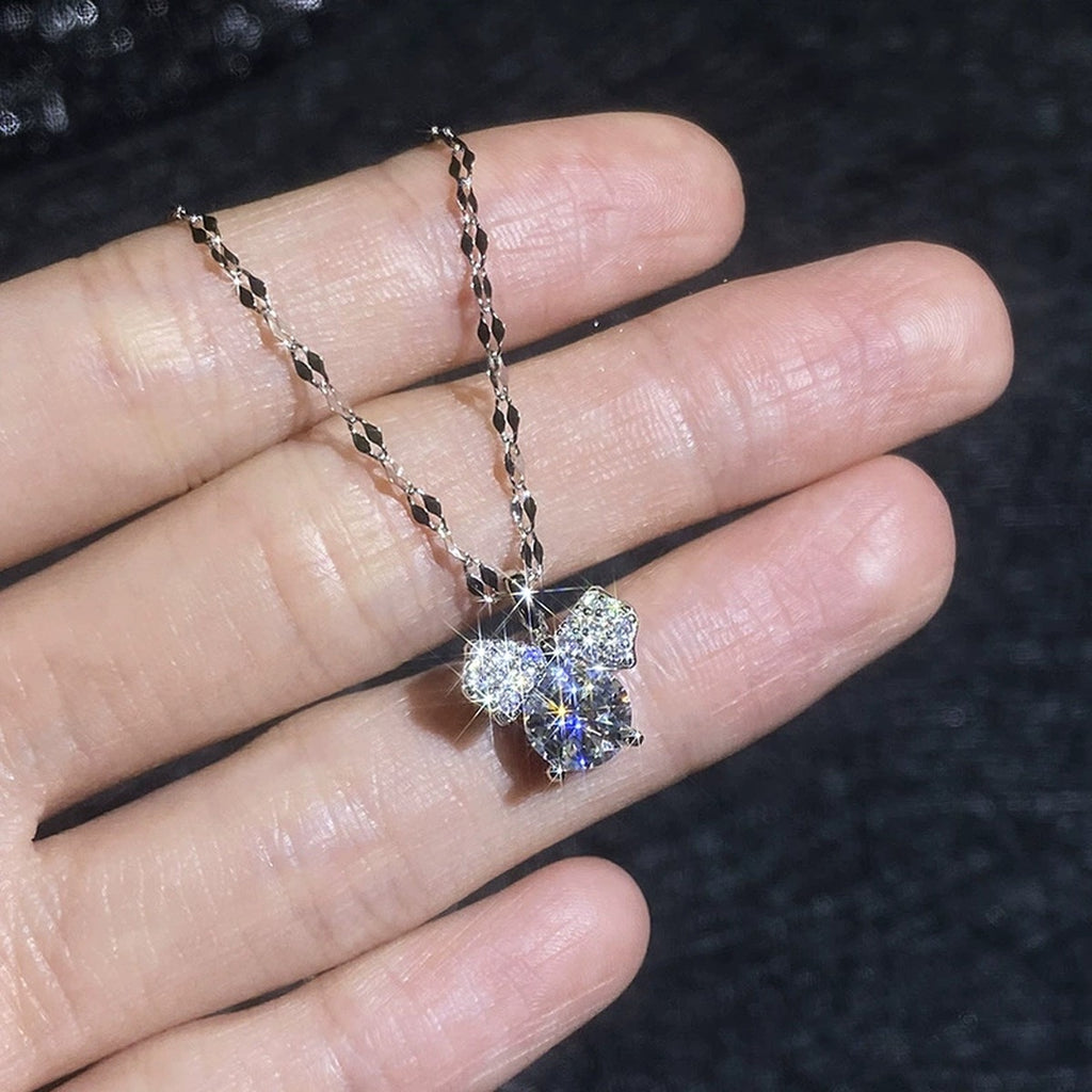 Bow Moissanite Pendant Necklace with Cubic Zirconia in Platinum-Plated S925 Sterling Silver close-up product detail view