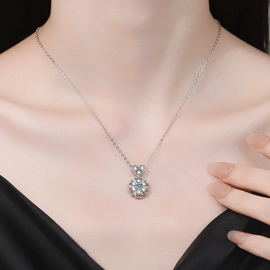 Floral Heart Moissanite Pendant Necklace with Cubic Zirconia in Platinum-Plated S925 Sterling Silver worn on neckline by model
