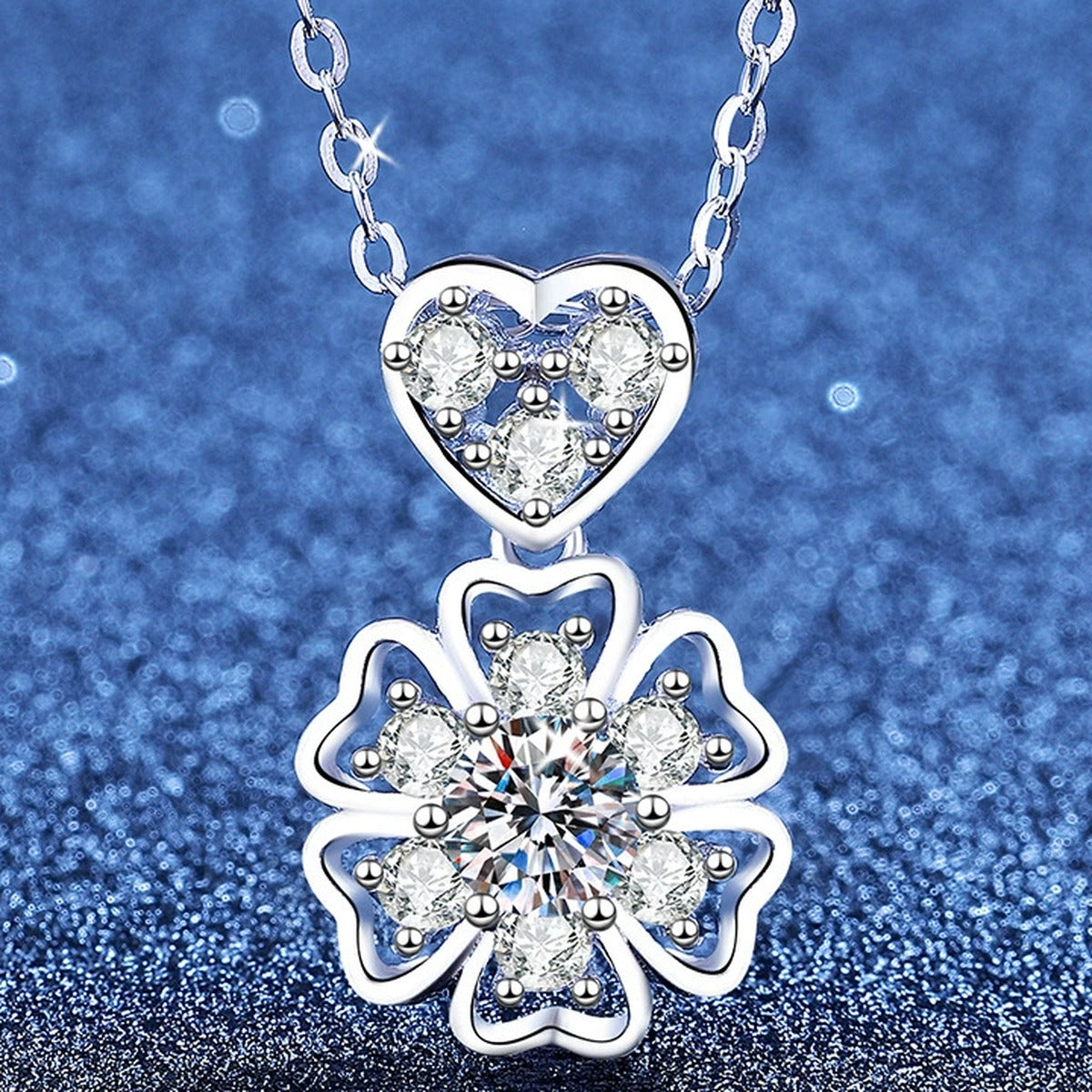 Floral Heart Moissanite Pendant Necklace with Cubic Zirconia in Platinum-Plated S925 Sterling Silver blue background angled view