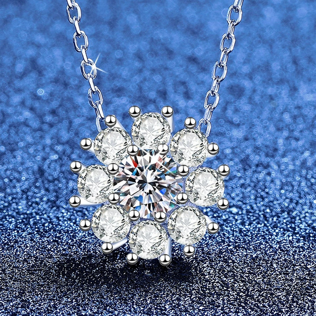 Sunflower Moissanite Pendant Necklace with Cubic Zirconia in Platinum-Plated S925 Sterling Silver blue background angled view