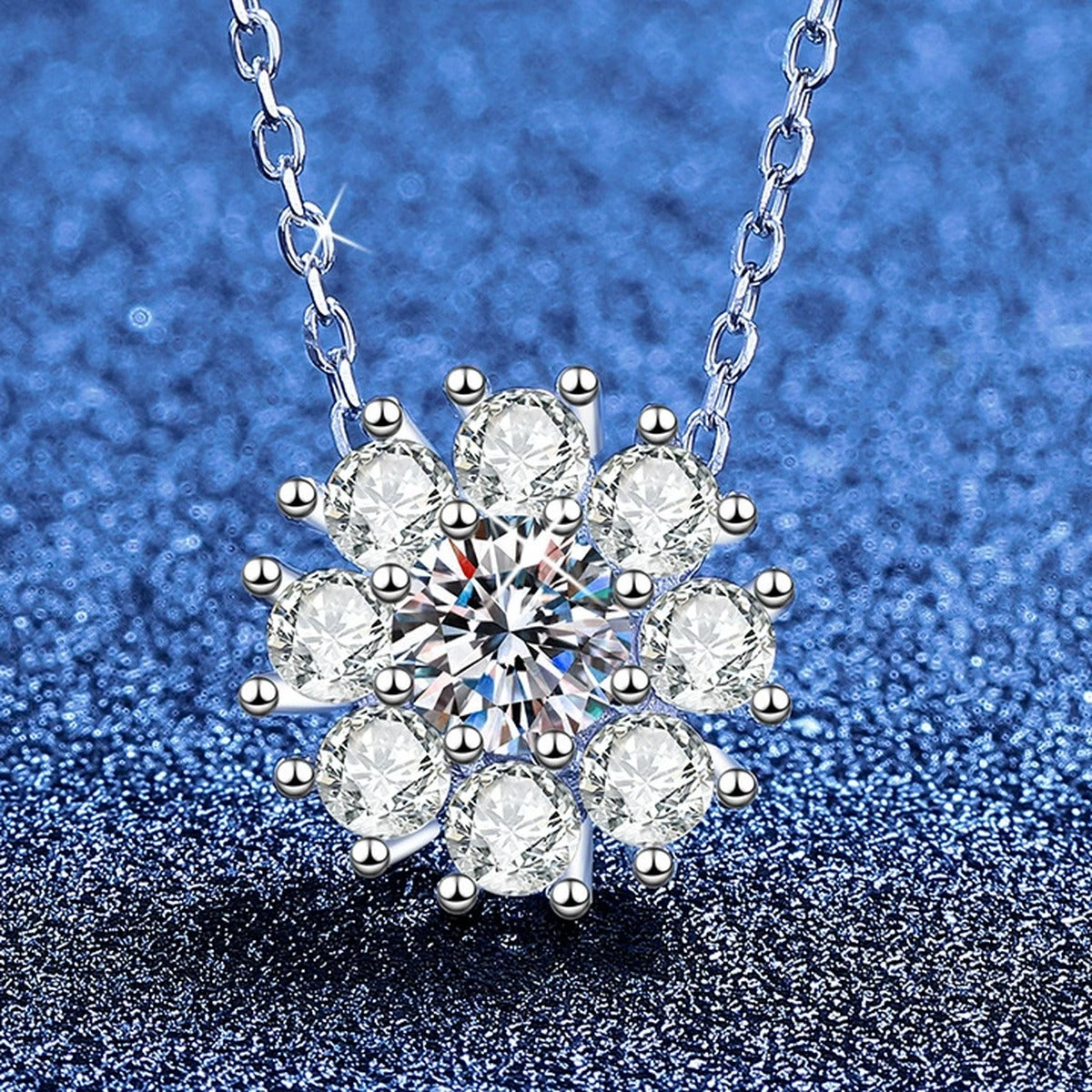 Sunflower Moissanite Pendant Necklace with Cubic Zirconia in Platinum-Plated S925 Sterling Silver blue background angled view
