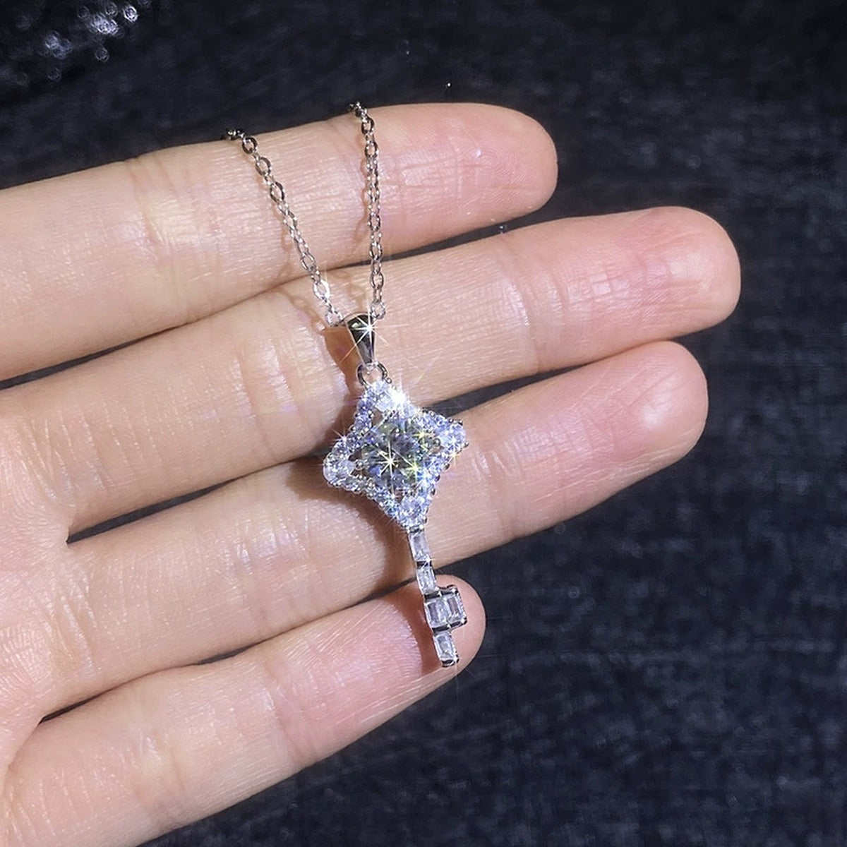 Ornate Key Moissanite Pendant Necklace with Cubic Zirconia in Platinum-Plated S925 Sterling Silver close-up product detail view