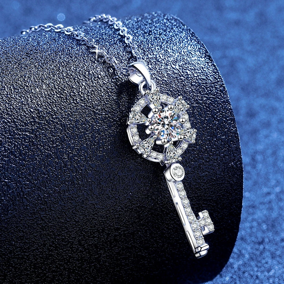 Round Halo Key Moissanite Pendant Necklace with Cubic Zirconia in Platinum-Plated S925 Sterling Silver blue background product view
