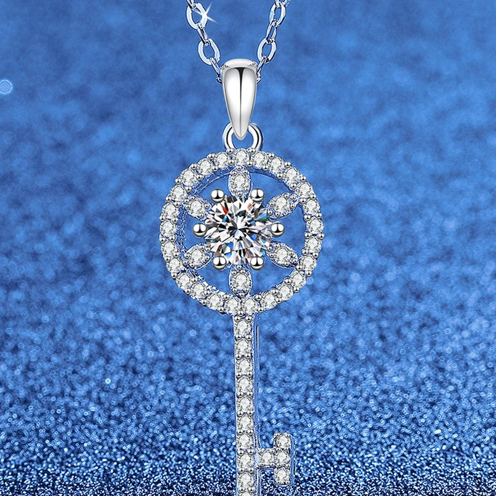 Round Key Moissanite Pendant Necklace with Cubic Zirconia in Platinum-Plated S925 Sterling Silver blue background product view