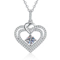 Heart Moissanite Pendant Necklace with Cubic Zirconia in White Gold-Plated S925 Sterling Silver on clean white background showing the heart pendant with a round moissanite center and cubic zirconia accents