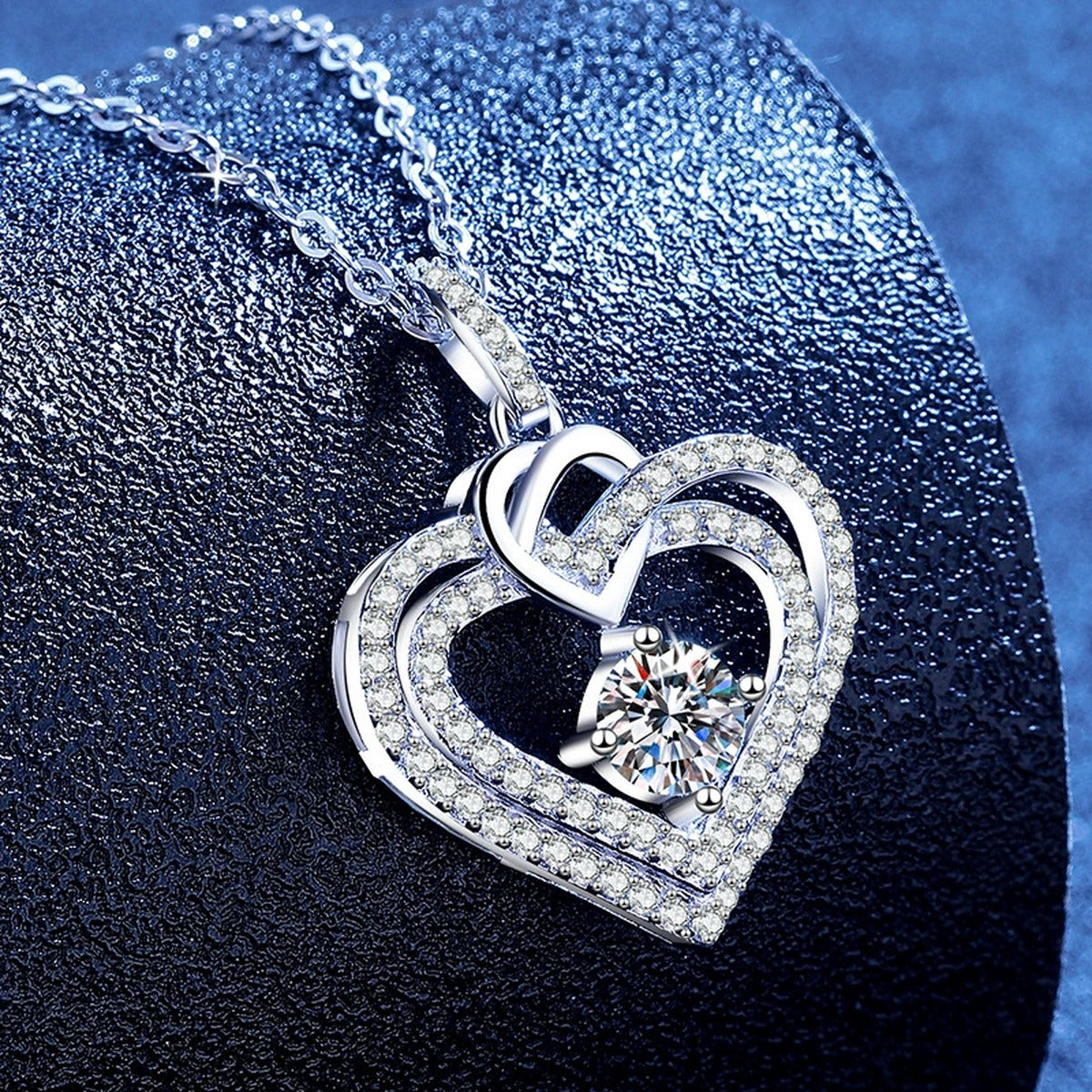 Heart Moissanite Pendant Necklace with Cubic Zirconia in White Gold-Plated S925 Sterling Silver blue background product view