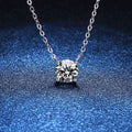 Round Moissanite Pendant Necklace in S925 Sterling Silver blue background angled view