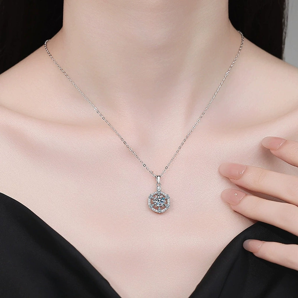 Round Halo Moissanite Pendant Necklace with Cubic Zirconia in White Gold-Plated S925 Sterling Silver worn on neckline by model