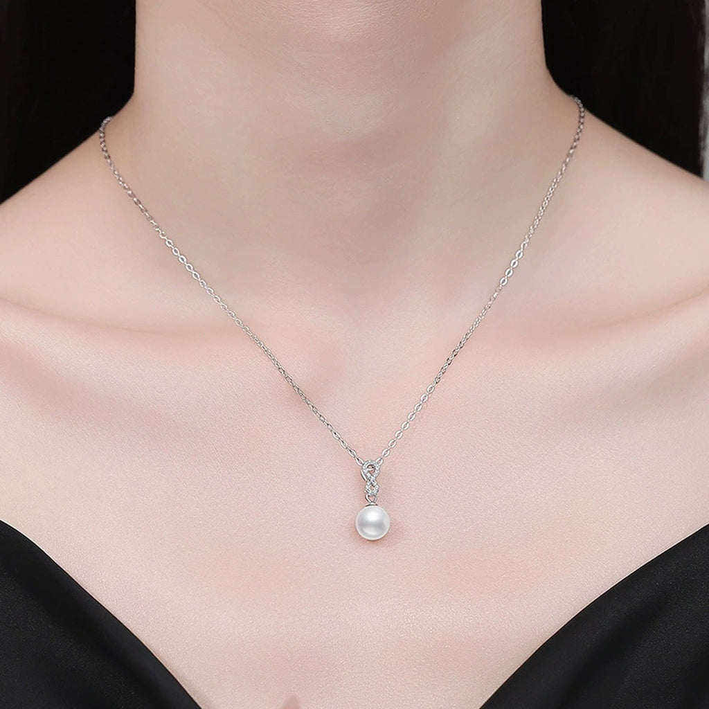 Moissanite Pearl Pendant Necklace in Gold-Plated S925 Sterling Silver worn on neckline by model