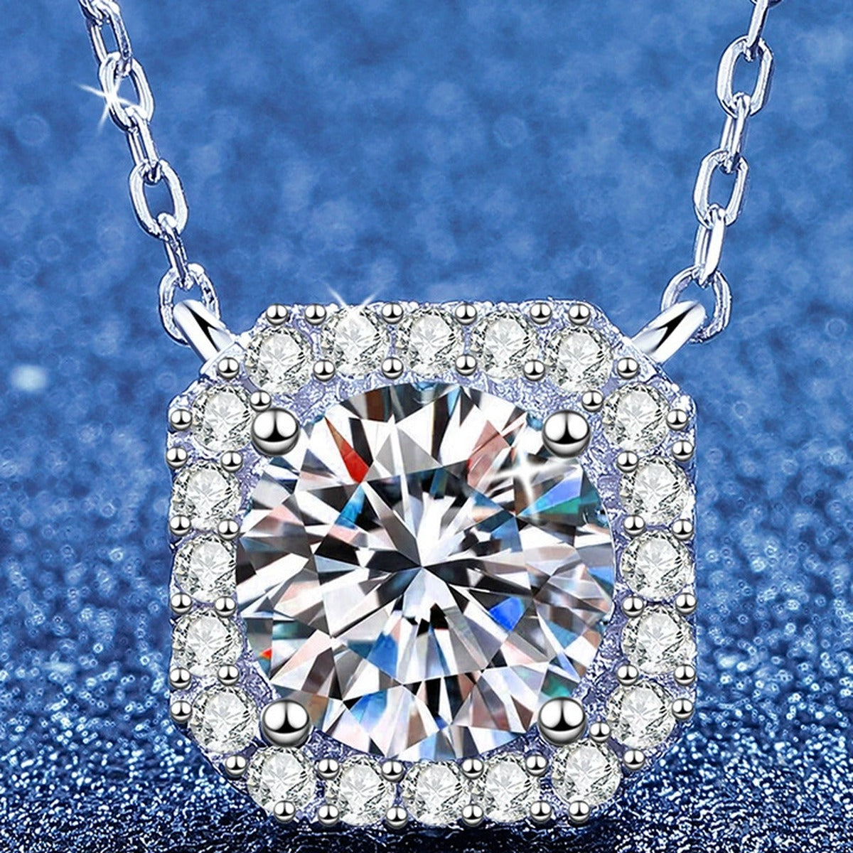 Cushion Moissanite Pendant Necklace with Cubic Zirconia in White Gold-Plated S925 Sterling Silver blue background angled view