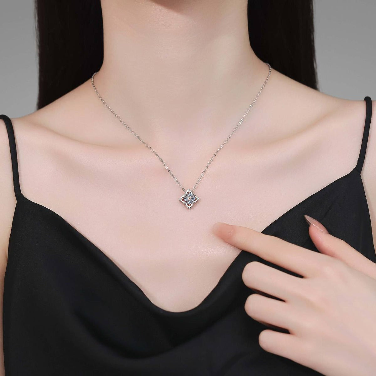 Round Moissanite Pendant Necklace in S925 Sterling Silver worn on neckline by model