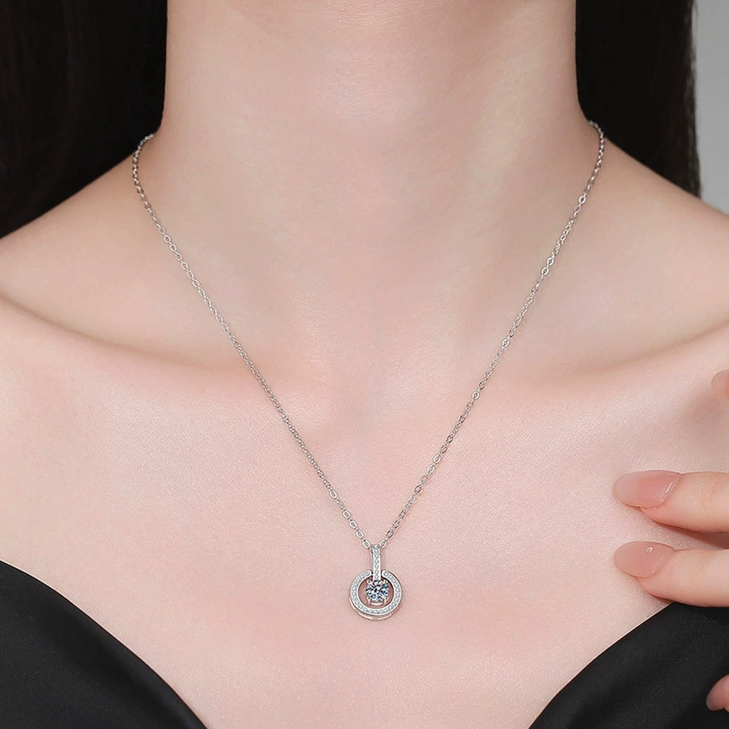 Round Moissanite Pendant Necklace with Cubic Zirconia in White Gold-Plated S925 Sterling Silver worn on neckline by model