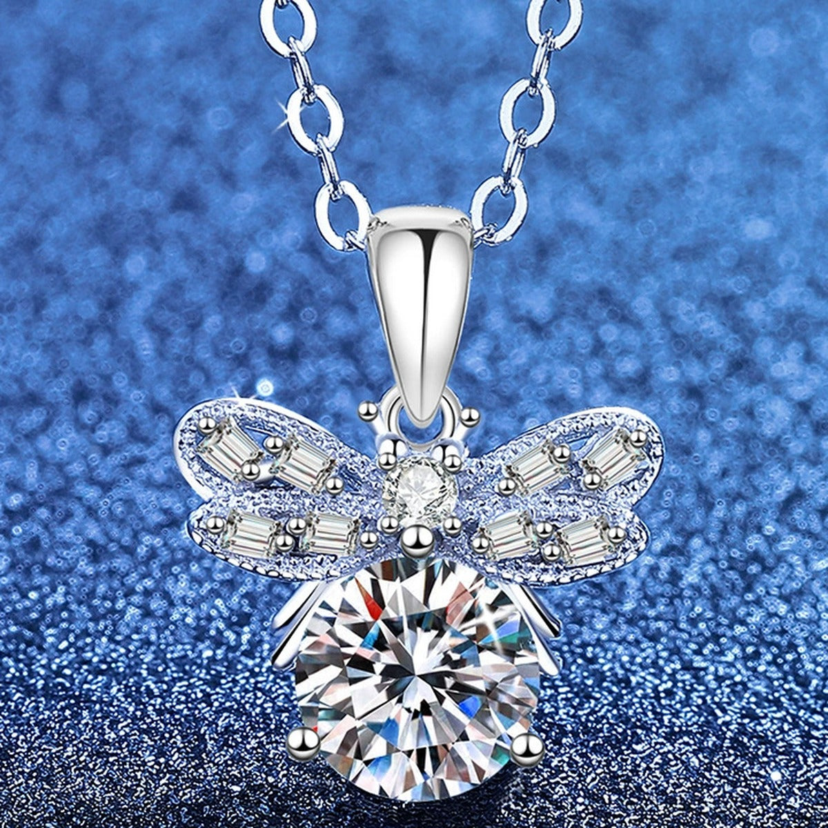 Round Moissanite Pendant Necklace with Cubic Zirconia in White Gold-Plated S925 Sterling Silver blue background angled view