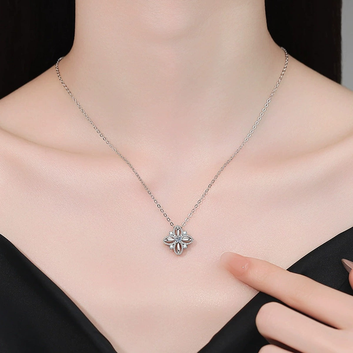 Petite Moissanite Pendant Necklace with Cubic Zirconia in White Gold-Plated S925 Sterling Silver worn on neckline by model