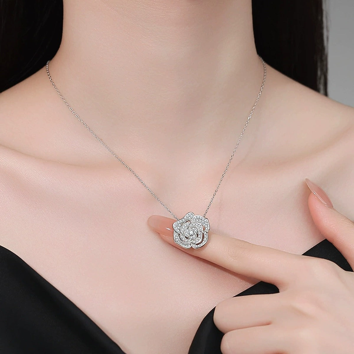 Pave Moissanite Pendant Necklace in White Gold-Plated S925 Sterling Silver worn on neckline by model