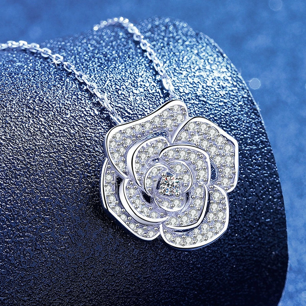 Pave Moissanite Pendant Necklace in White Gold-Plated S925 Sterling Silver blue background angled view