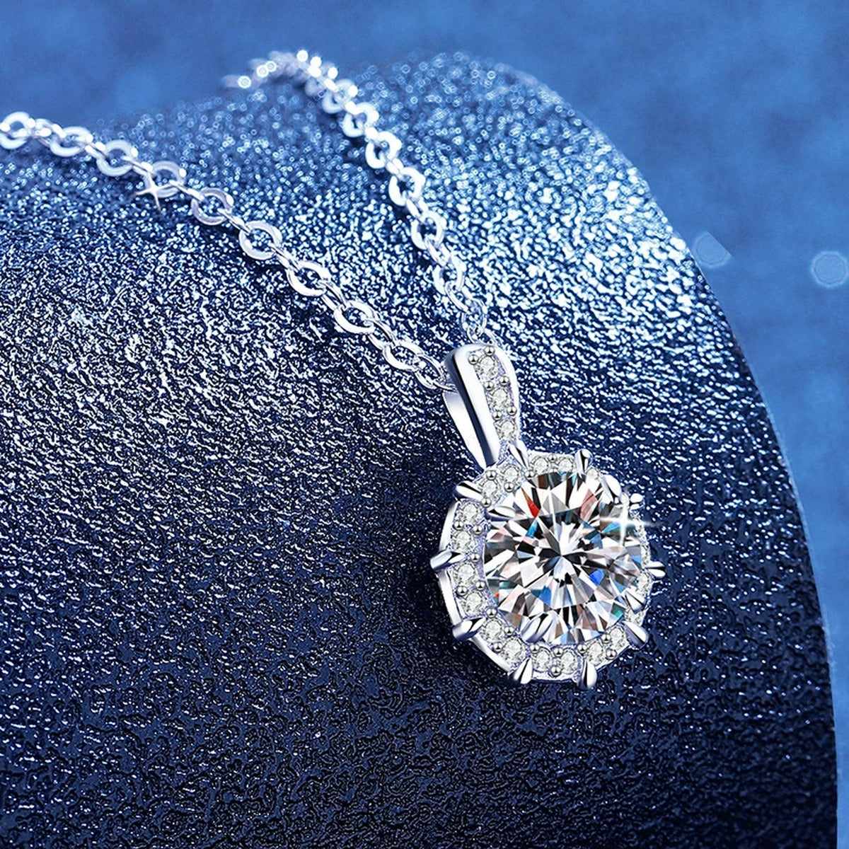 Round Moissanite Pendant Necklace with Cubic Zirconia in White Gold-Plated S925 Sterling Silver blue background product view