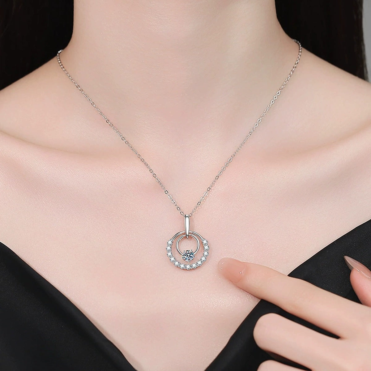 Circle Moissanite Pendant Necklace with Cubic Zirconia in White Gold-Plated S925 Sterling Silver worn on neckline by model