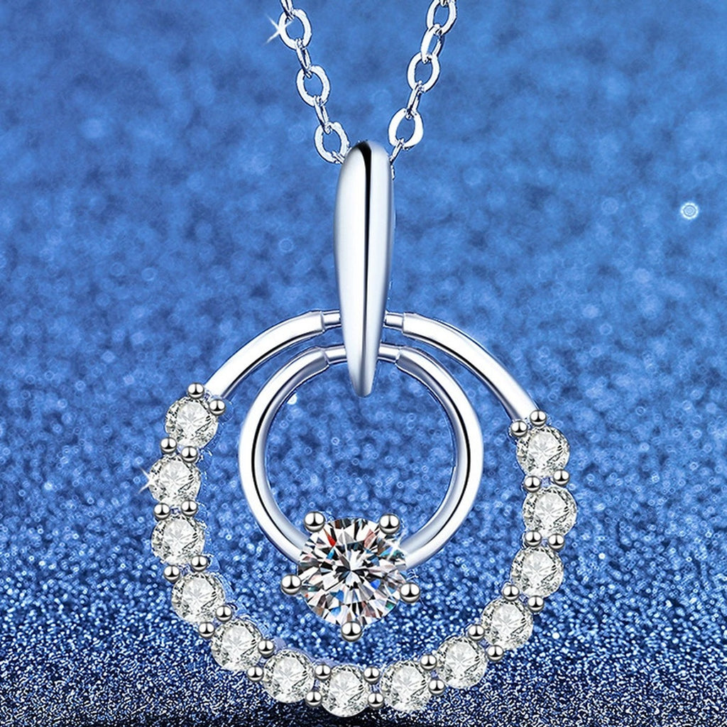 Circle Moissanite Pendant Necklace with Cubic Zirconia in White Gold-Plated S925 Sterling Silver blue background product view