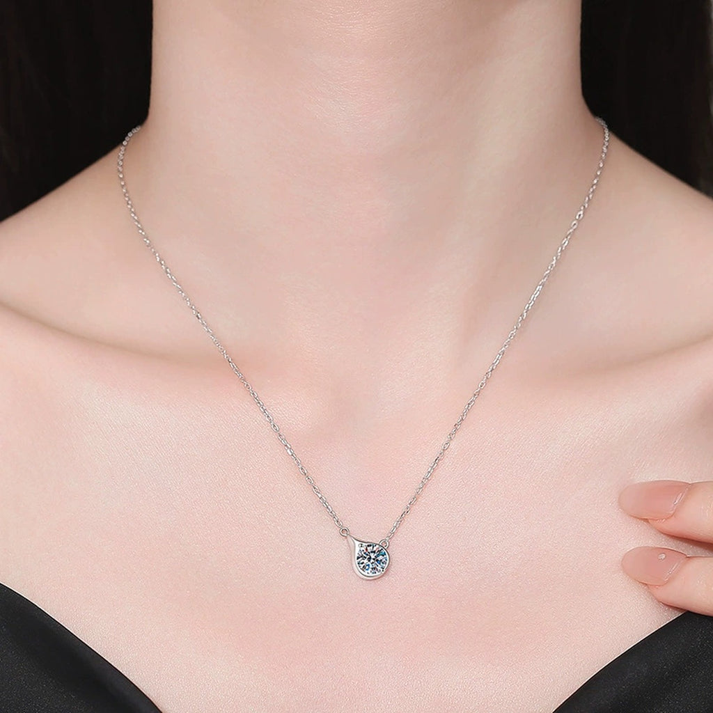 Model wearing a platinum-plated S925 sterling silver swirl moissanite pendant necklace