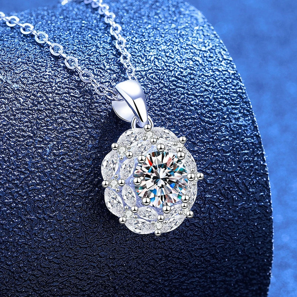 Round Moissanite Pendant Necklace with Cubic Zirconia in White Gold-Plated S925 Sterling Silver blue background angled view