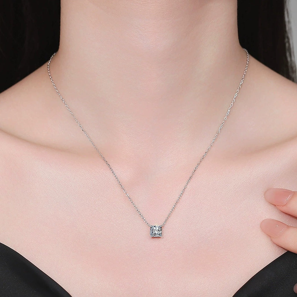 Princess Moissanite Pendant Necklace in White Gold-Plated S925 Sterling Silver worn on neckline by model