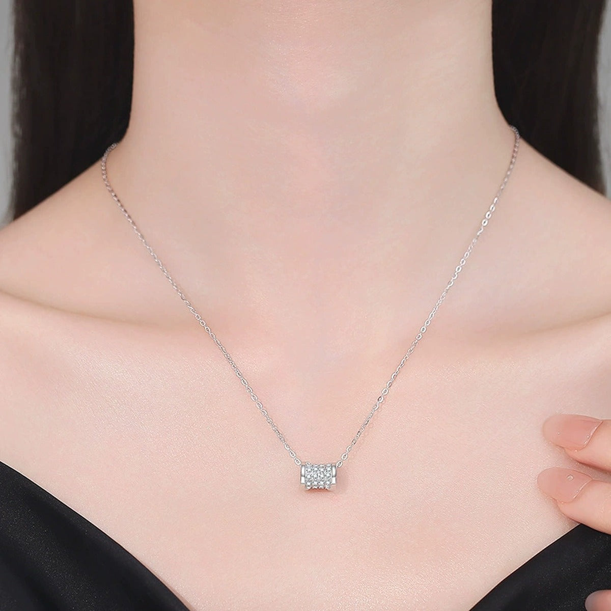 Round Moissanite Pendant Necklace in White Gold-Plated S925 Sterling Silver worn on neckline by model