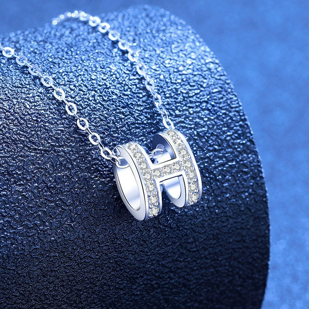 Pave Letter H Moissanite Pendant Necklace in White Gold-Plated S925 Sterling Silver blue background product view